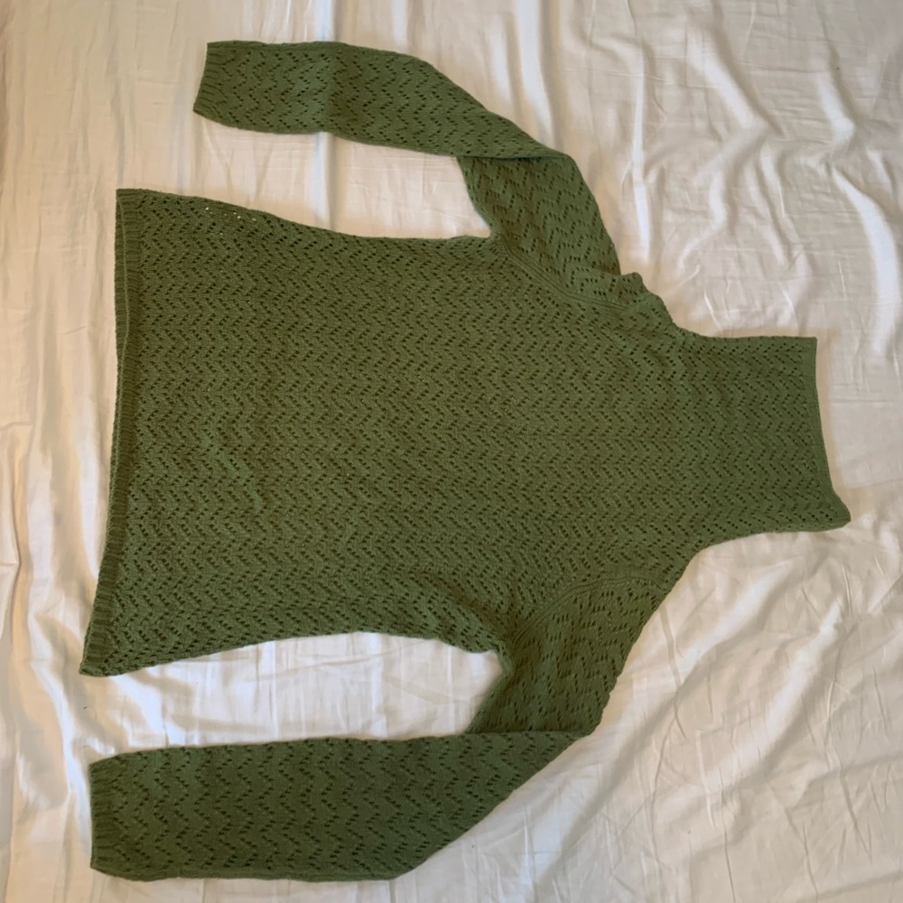 Knitted green long sleeve turtleneck sweater